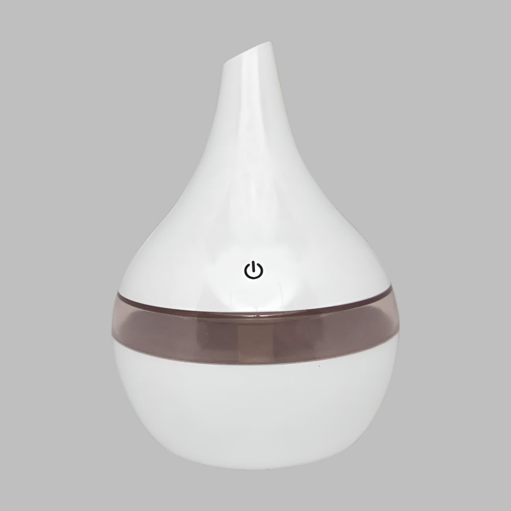 Idées cadeaux pour adulte – vue produit du diffuseur d’huiles essentielles blanc, idéal pour bien-être et aromathérapie à la maison. Koolkado.