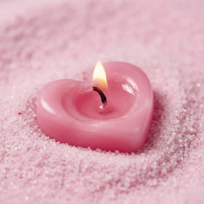 Idées cadeaux avec sable à bougie baby pink en grains, parfait pour offrir une ambiance poétique et apaisante.