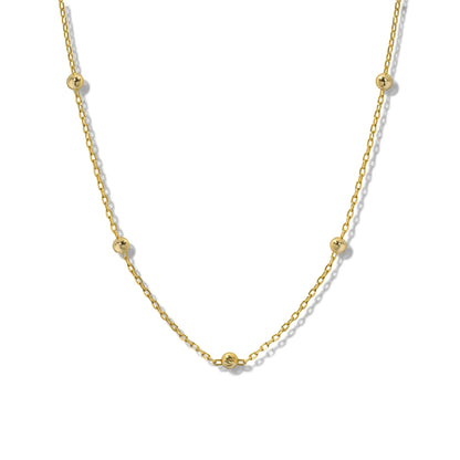 Collier Chloe Choker en plaqué or 18K avec petites perles dorées sur chaîne fine. Idée cadeau femme.