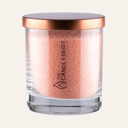 Idées cadeaux bougie décorative sable pêche Candledust en verre, idéale pour une décoration de maison douce et élégante.