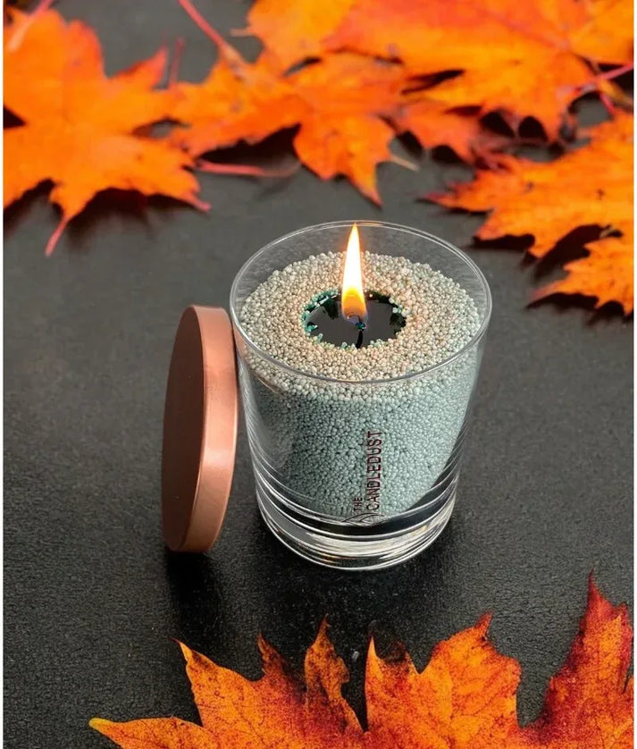 Idées cadeaux bougie décorative Candledust vert émeraude, idéale pour une ambiance chaleureuse et décorative à la maison.