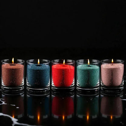 Idées cadeaux collection de bougies décoratives Candledust en verre, plusieurs couleurs pour une décoration de maison raffinée et harmonieuse.