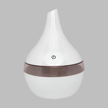 Idées cadeaux pour adulte – vue produit du diffuseur d’huiles essentielles blanc, idéal pour bien-être et aromathérapie à la maison. Koolkado.
